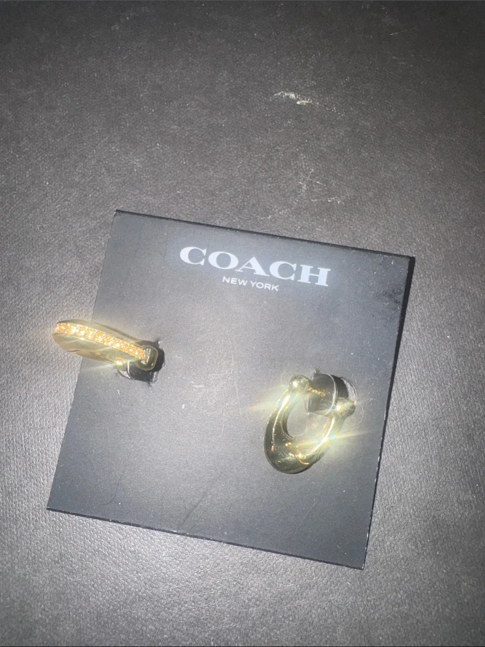 Coach Gold-Tone Interlocking Hoop Stud Earrings - Picture 2 of 4